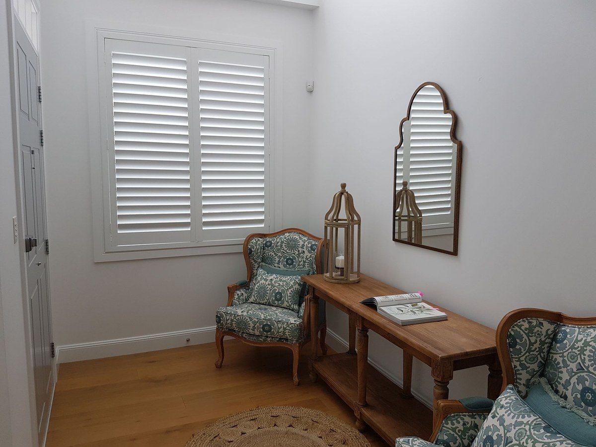 Plantation shutters installed in a Gold Coast home living room